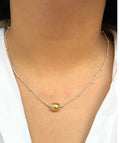 Golden sphere chain pendant